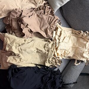 SKIMS Shapewear in Black, Tan, and Cream